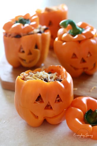 Jack-O-Lantern Chicken and Rice Stuffed Peppers