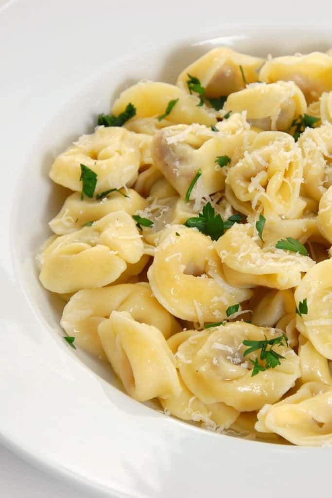 Skillet Cacio e Pepe Tortellini With Wilted Greens